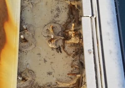 plate inside the gutter makes water stucks scaled
